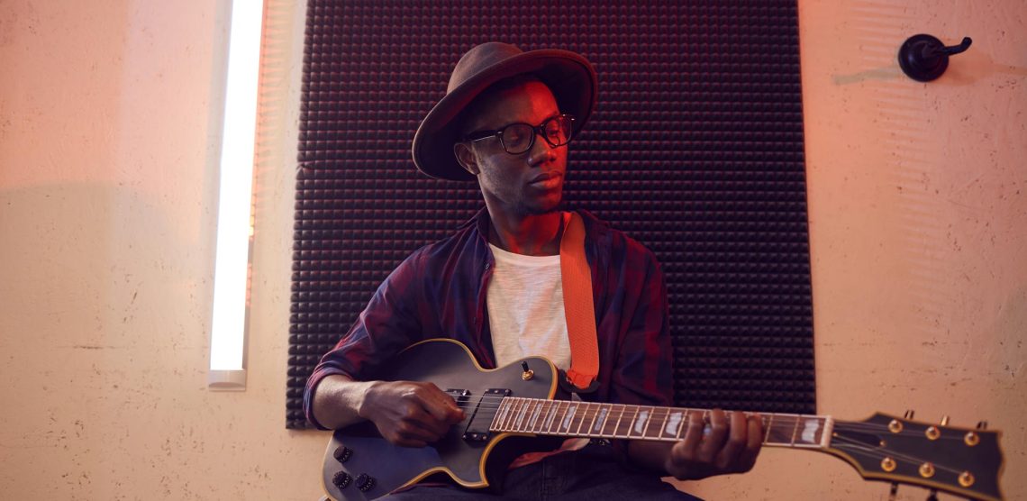 african-american-man-playing-guitar-L77MTX8.jpg